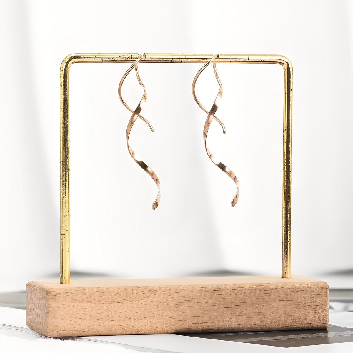Mel – Pendientes espirales dorados