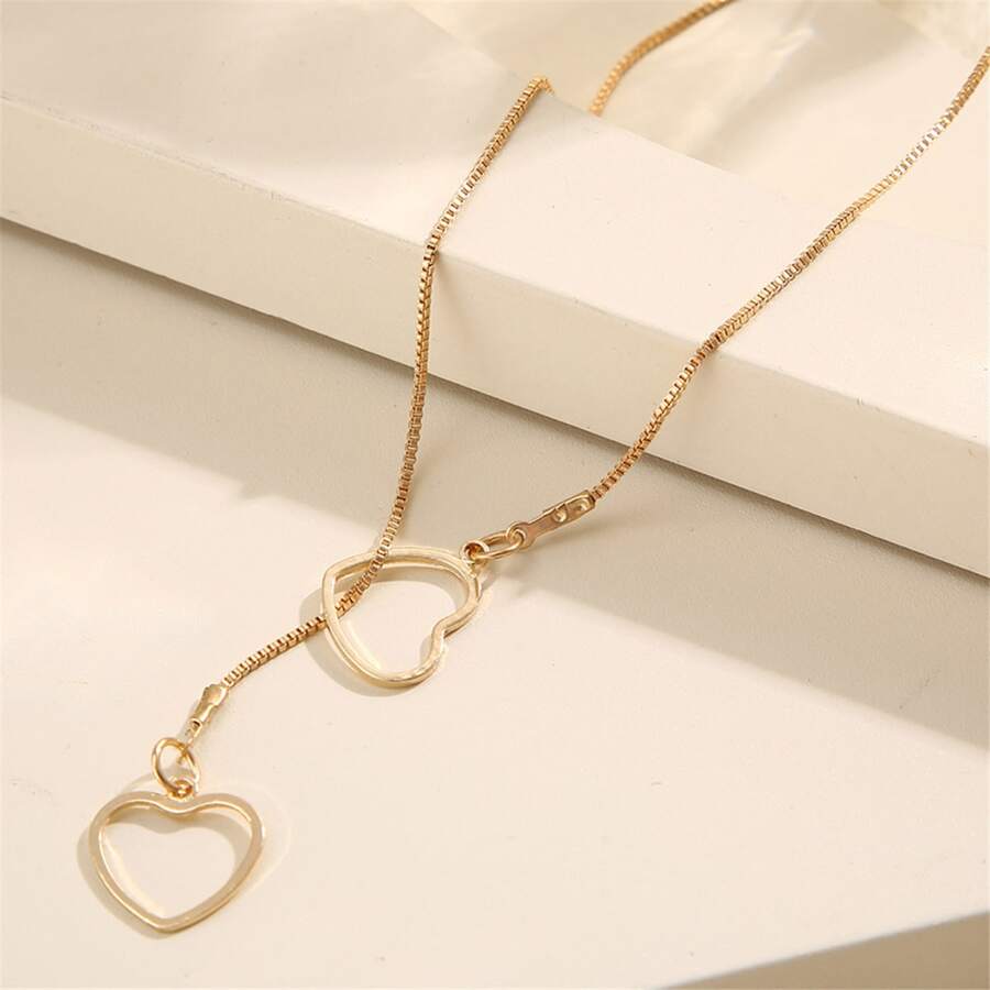 Collar de gotas de corazón - Collar dorado con 2 corazones