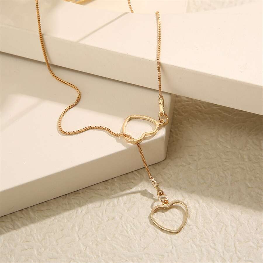 Collar de gotas de corazón - Collar dorado con 2 corazones