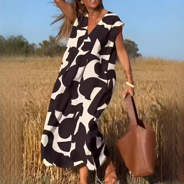 Vicky - Vestido Elegante con Corte Amplio y Escote en V