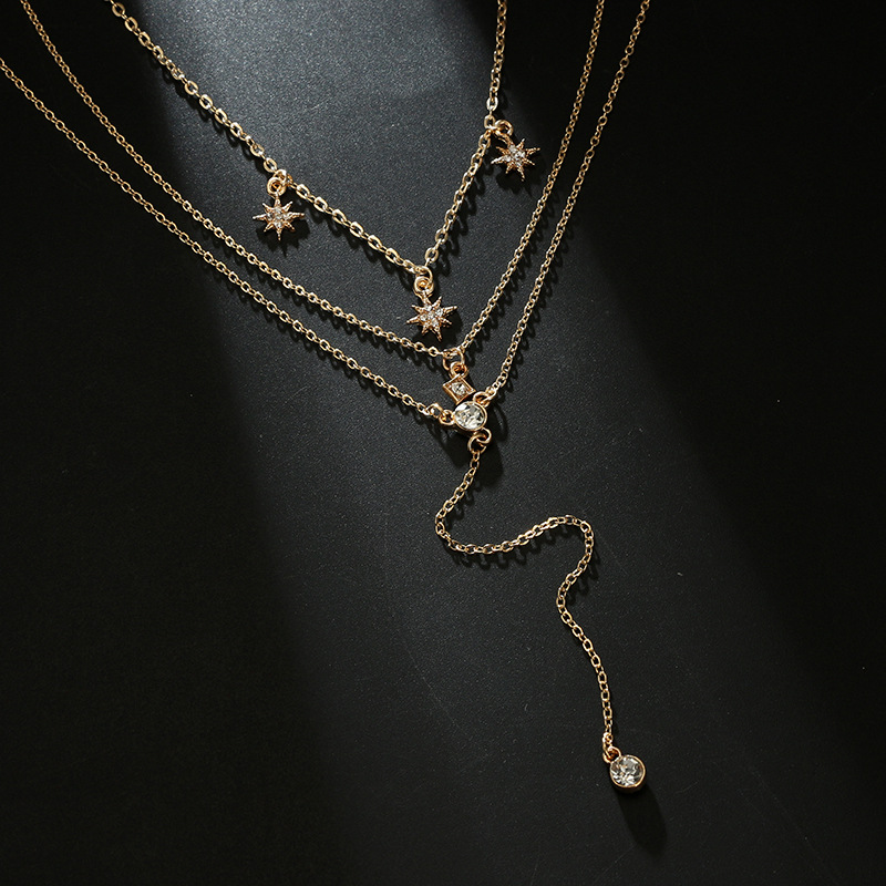 Collar en capas con colgantes de estrella boho de cristal