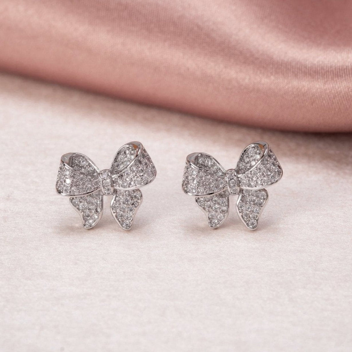 Minerva - pendientes con diseño de lazo en plata esterlina