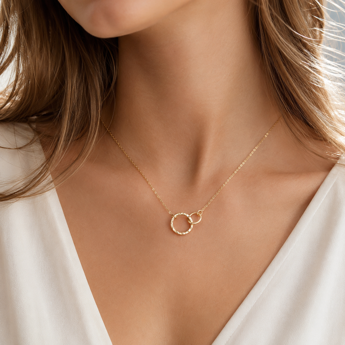 Isabelle - Cadena de aros dorados