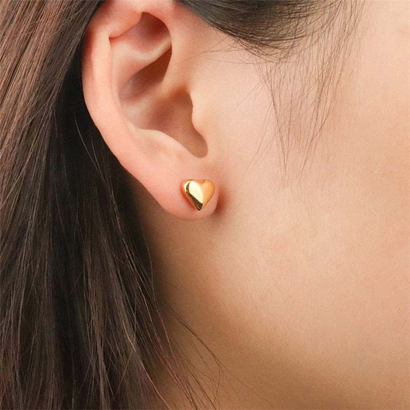 Mila – Pendientes en forma de corazón dorados