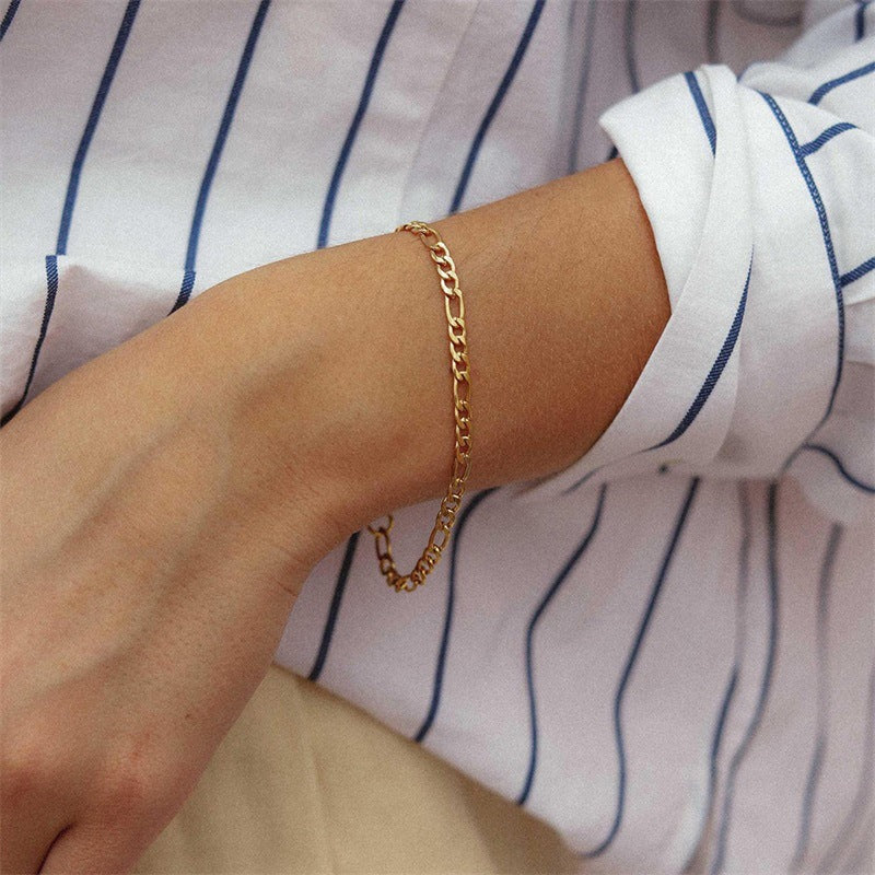 Saturn - Pulsera de eslabones dorados