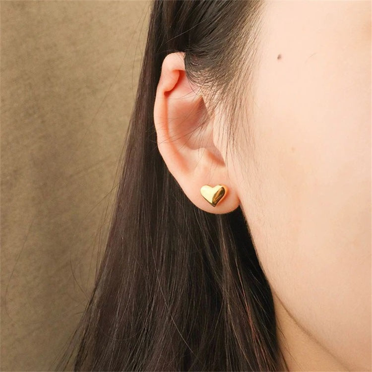 Mila – Pendientes en forma de corazón dorados