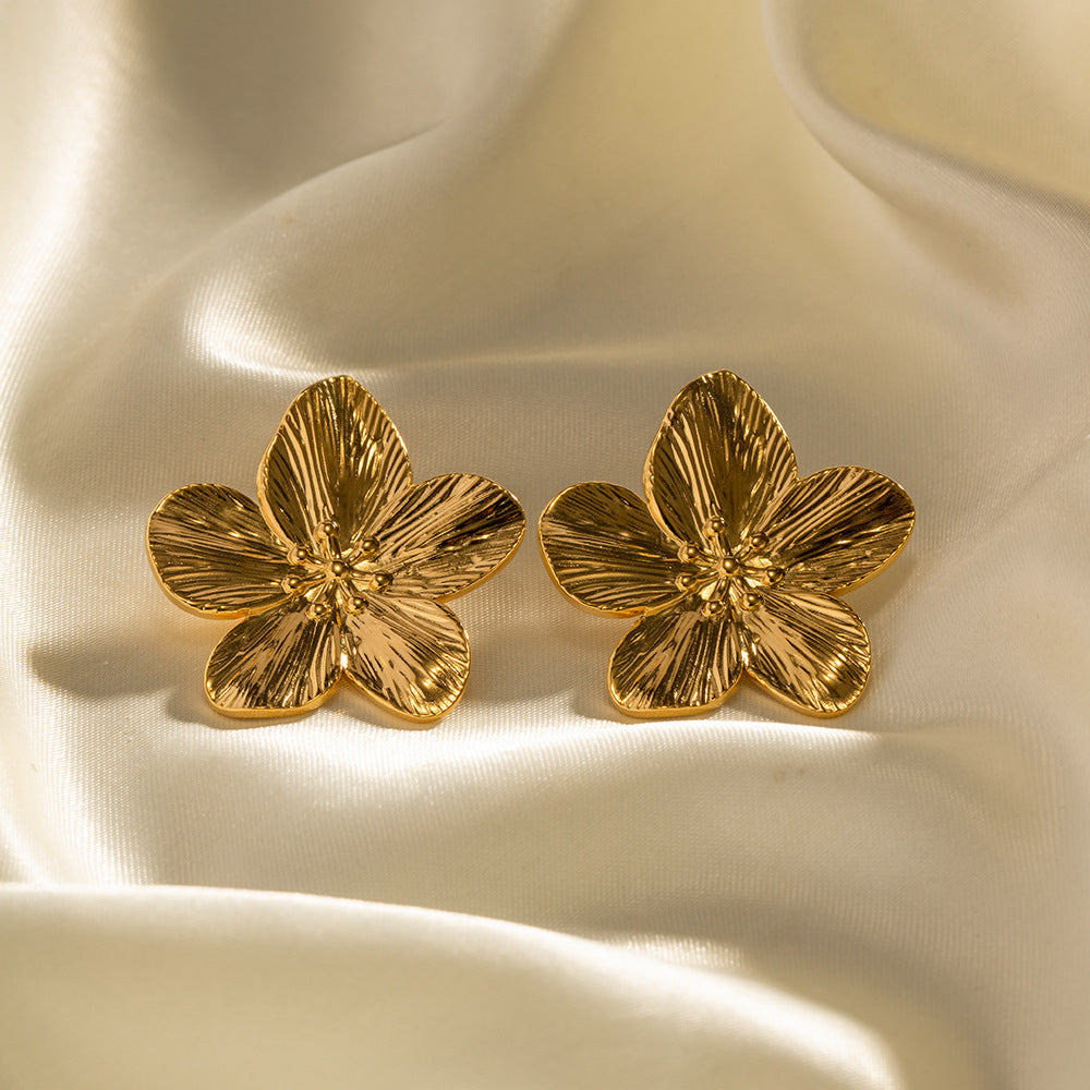 Allysa - Pendientes con diseño floral dorado