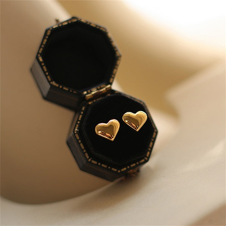 Mila – Pendientes en forma de corazón dorados
