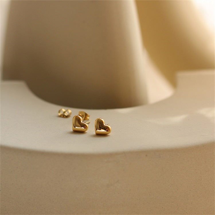 Mila – Pendientes en forma de corazón dorados