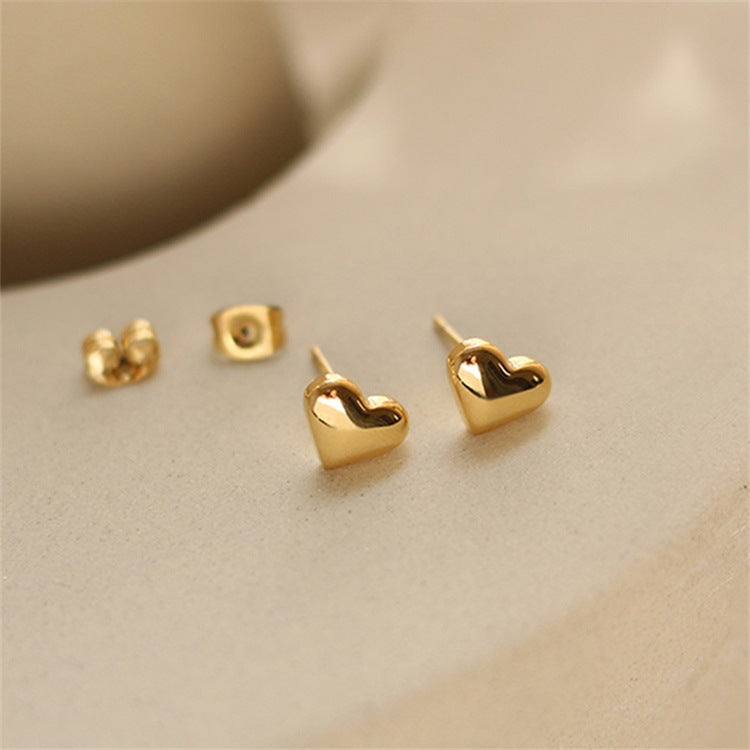 Mila – Pendientes en forma de corazón dorados