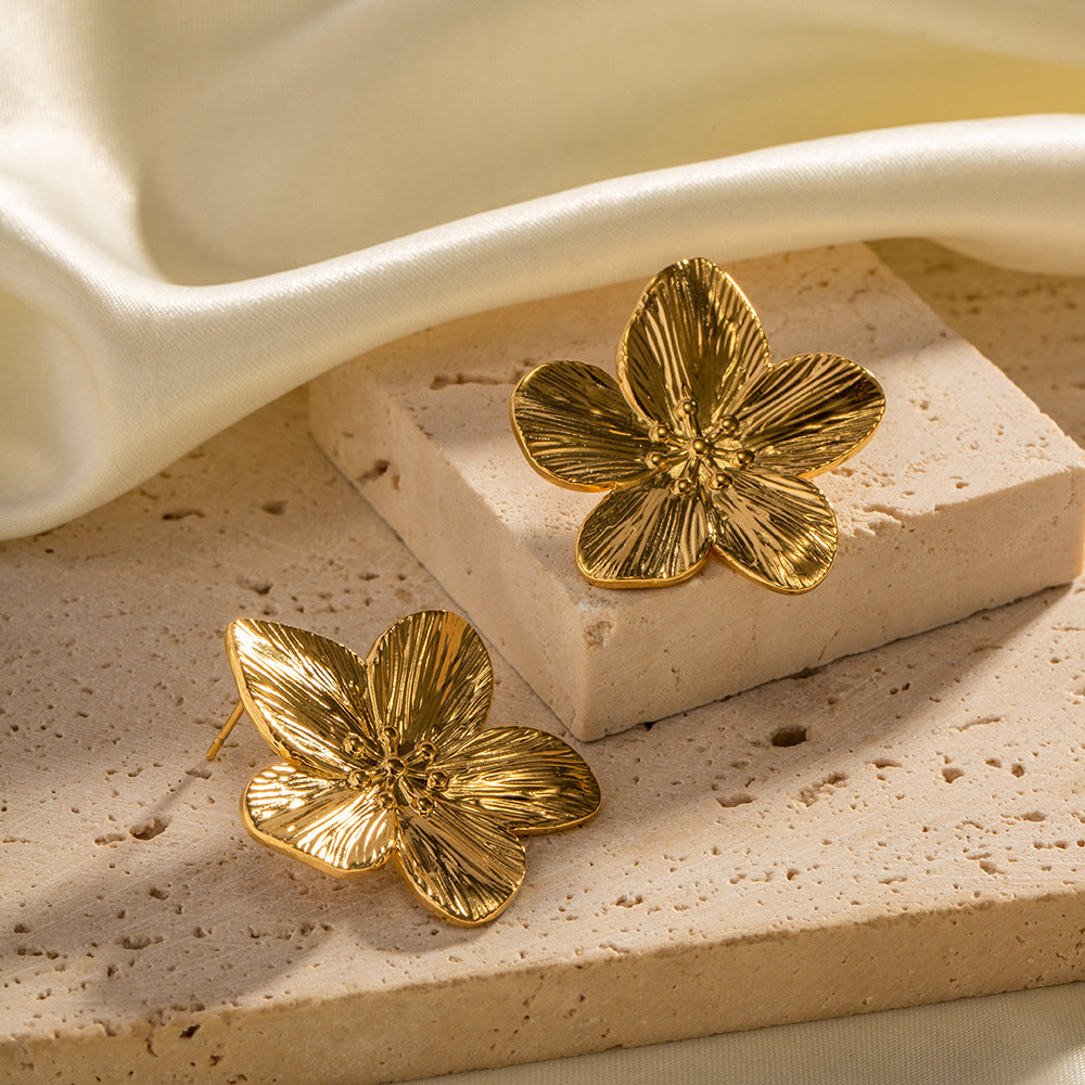 Allysa - Pendientes con diseño floral dorado