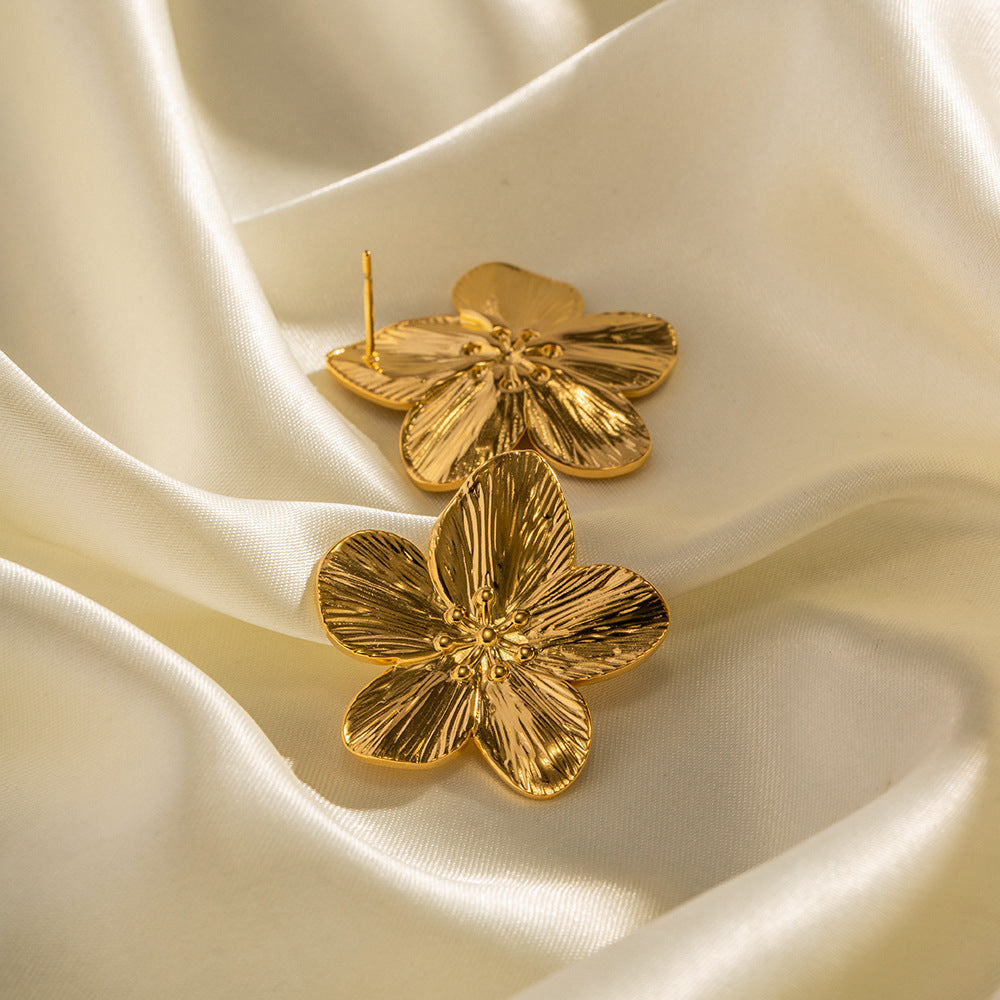 Allysa - Pendientes con diseño floral dorado
