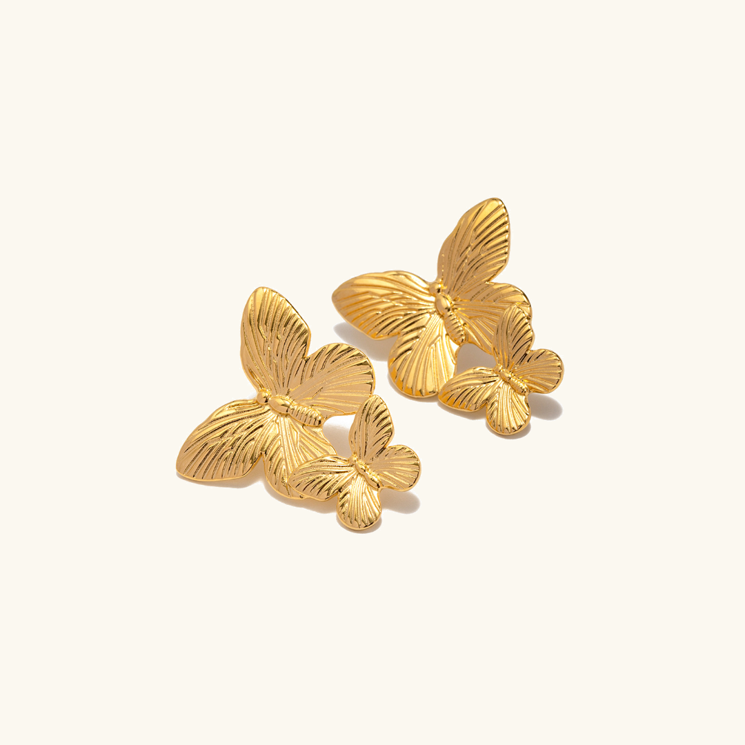 Mariah - Pendientes en forma de mariposa dorados