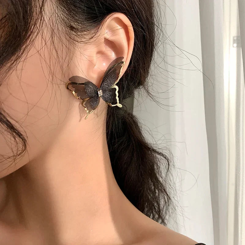 Jean – Pendientes de mariposa de tejido ligero
