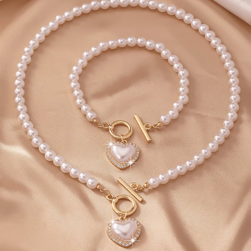 Lara – Set de collar y pulsera Corazón Perlé