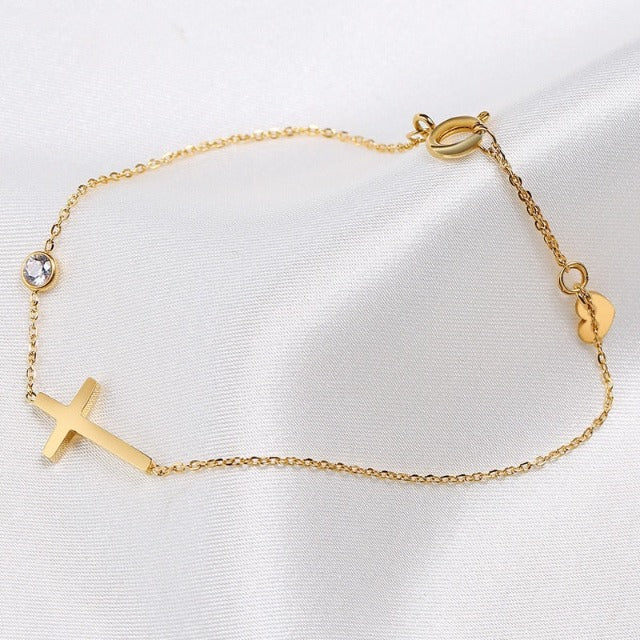 Althea – Pulsera con cruz para damas en oro y plata