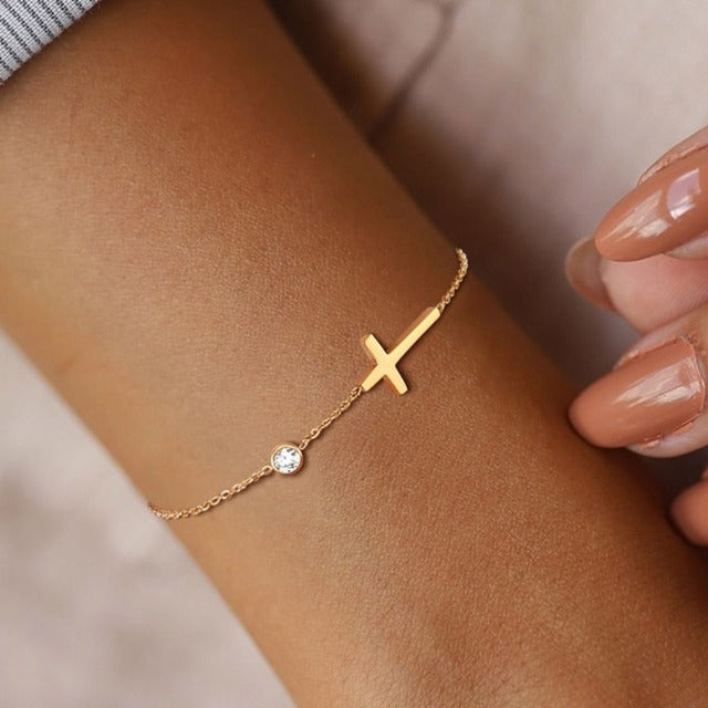 Althea – Pulsera con cruz para damas en oro y plata