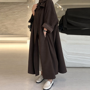 Abrigo largo mujer de corte oversize con botones y bolsillos laterales