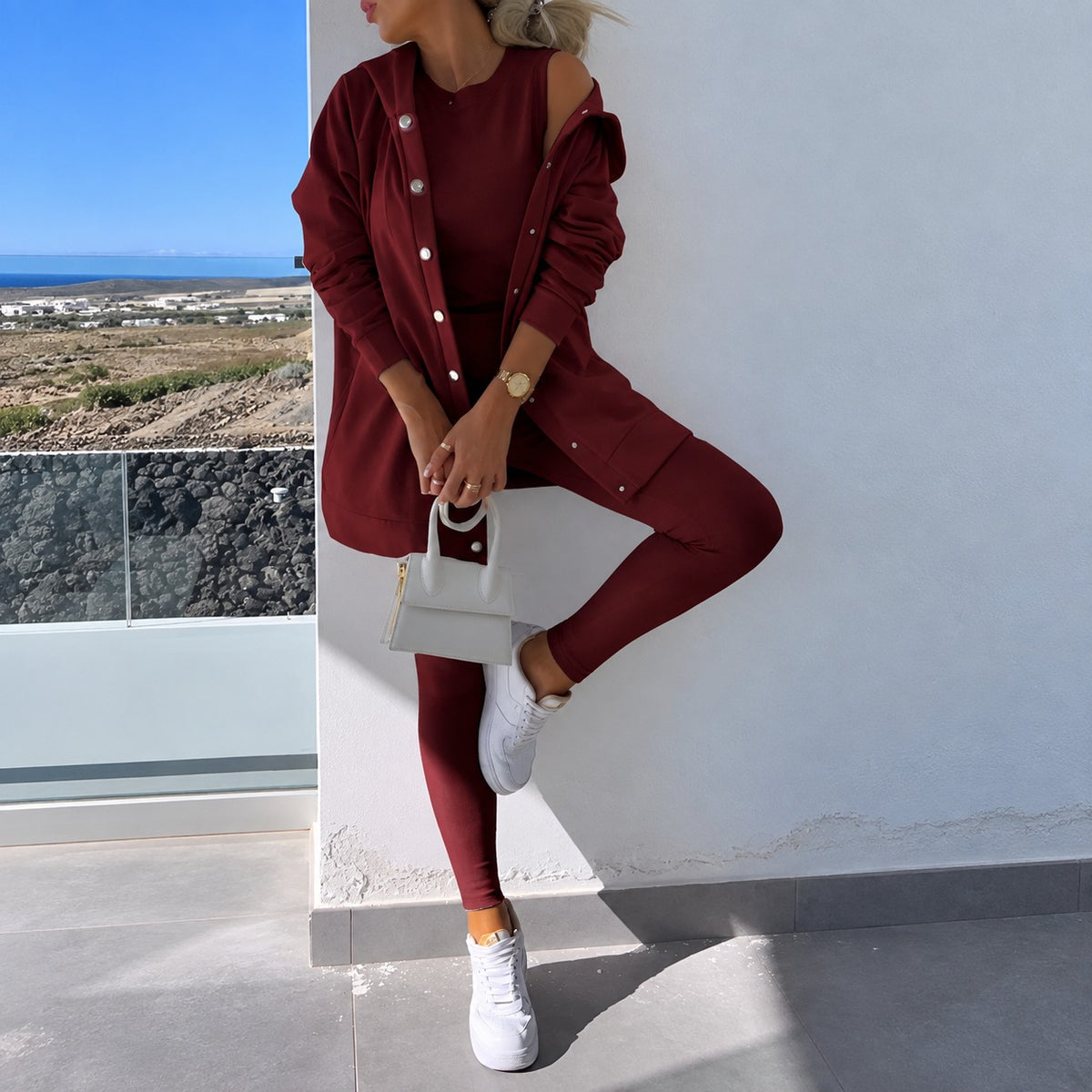Conjunto mujer con chaqueta de manga larga con cierre de botones y leggings ajustados