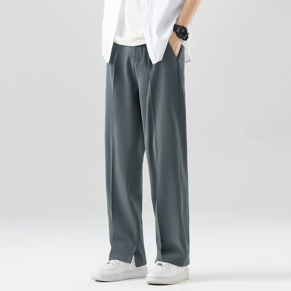 Pantalones de corte ancho para hombre con bolsillos laterales y cintura con botón