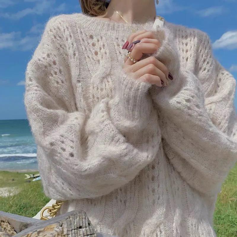 Suéter oversize de mujer con manga larga y detalle de abertura en el tejido