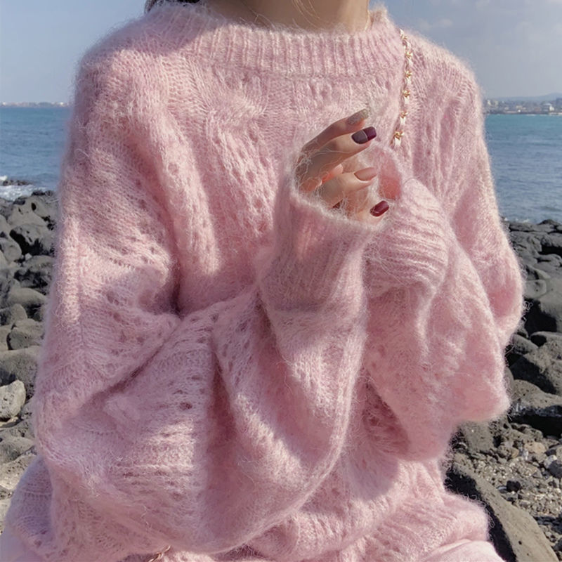 Suéter oversize de mujer con manga larga y detalle de abertura en el tejido