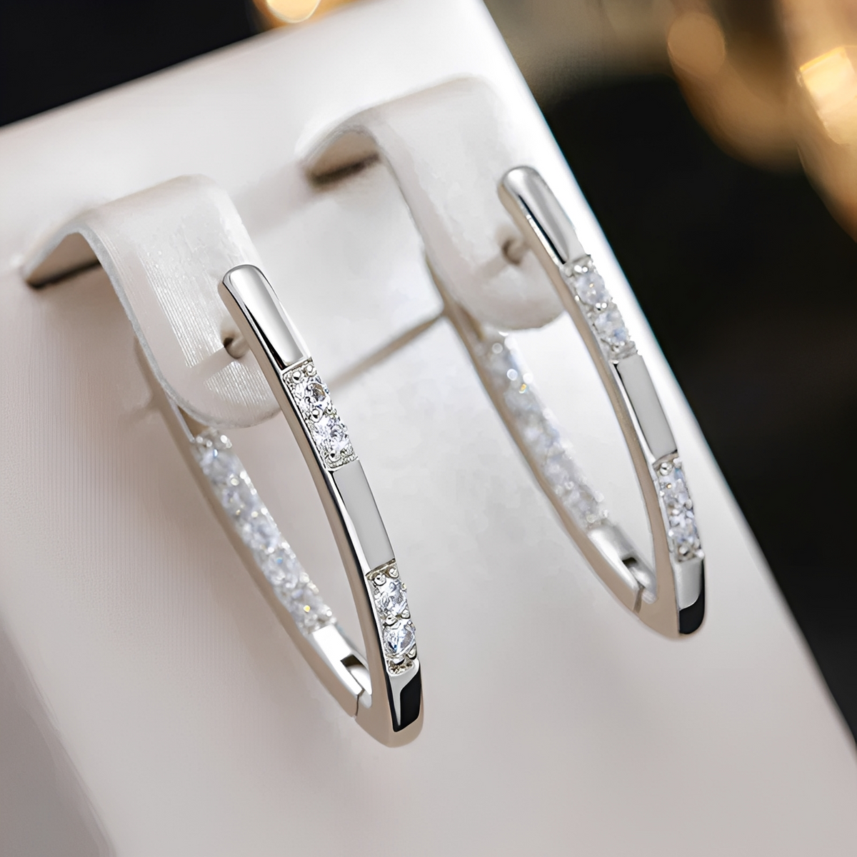 Cleah – Pendientes sofisticados de zirconia dorada