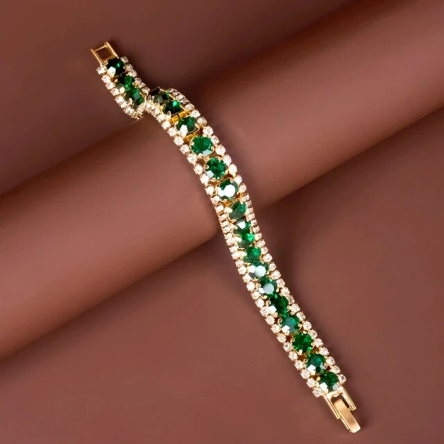 Maud – Pulsera dorada estilosa con detalles verdes