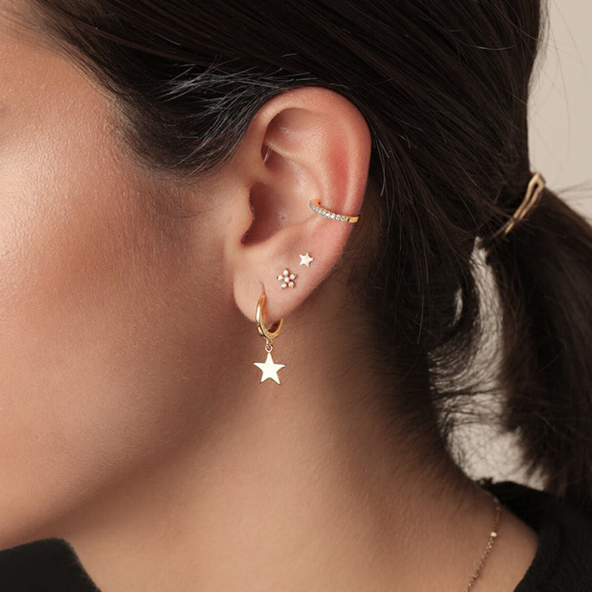 Stellia – Pendientes en forma de estrella con cinco puntas en tono dorado