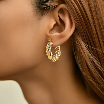 Alix – Pendientes U-Twist en dorado