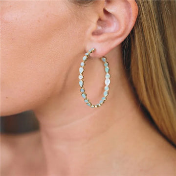 Raya – Aros vintage dorados con ópalo azul