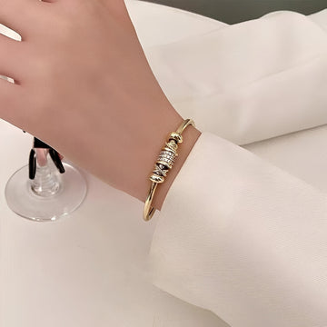 Amalia – Pulsera regulable con encantos dorados
