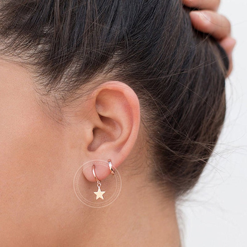 Stellia – Pendientes en forma de estrella con cinco puntas en tono dorado
